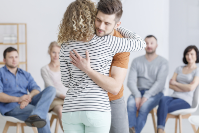 Hugging during support group meeting in rehab